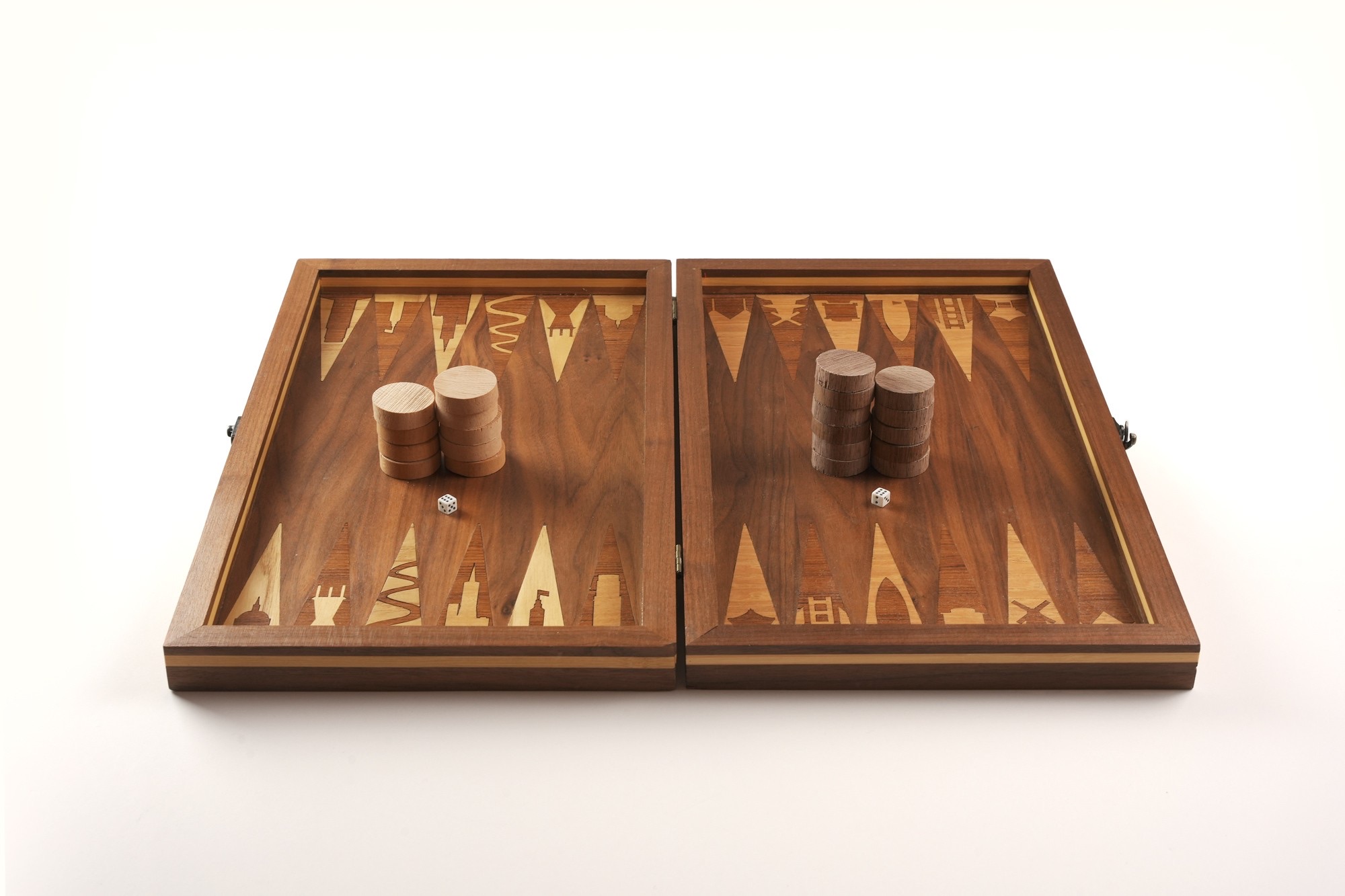 The backgammon board opened on a table